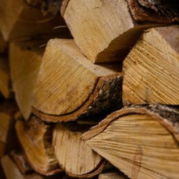 Stack of chopped wood for burning in the pizza oven